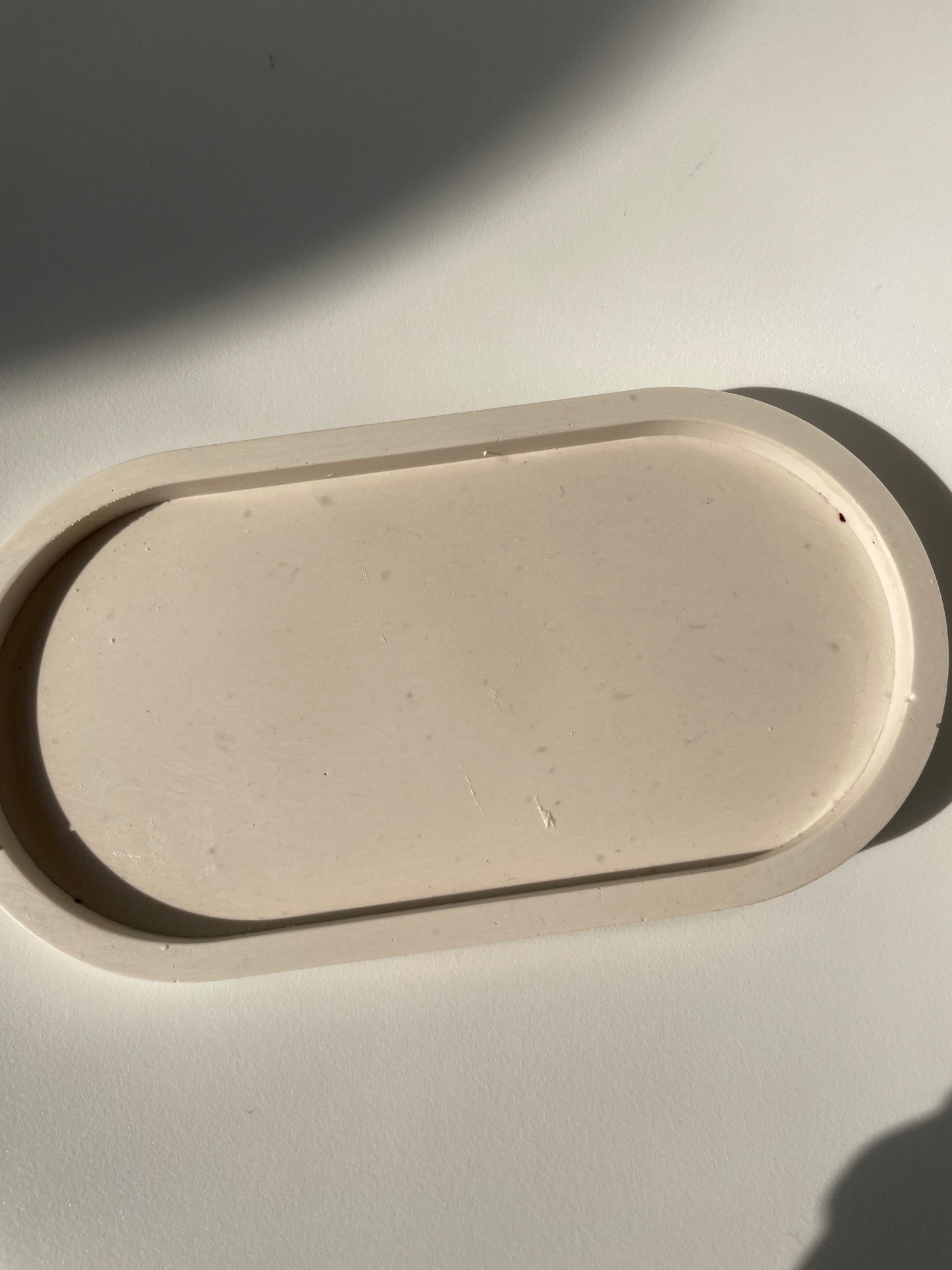 image of an oval tray with slight imiperfections
